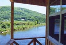 Photograph of Cajun Cedar Log Cottages, Margaree Valley